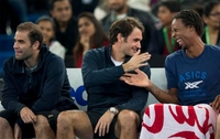 Šta Federer radi uz Monfisa?