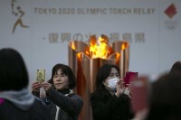 Uklonjen olimpijski plamen u Japanu