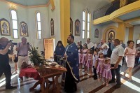 Dodik kumovao na krštenju devetoro djece