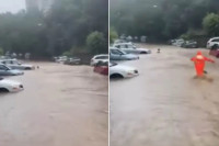 Радник Градске чистоће спасио жену из бујице (ВИДЕО)