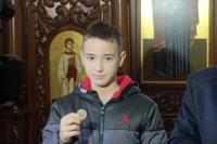 Marko izvukao zlatnik u velikoj božićnoj česnici