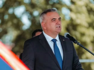 Minić obaćao pomoć Šarićima